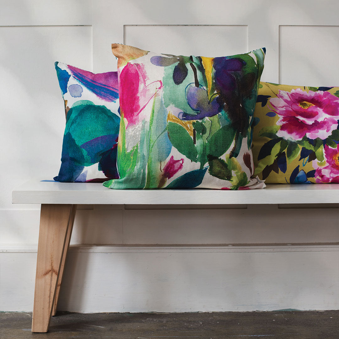 bluebellgray abstract and floral cushions on a bench